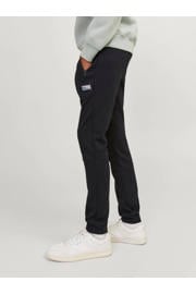 thumbnail: Zwarte jongens JACK & JONES JUNIOR joggingbroek van sweat materiaal met regular waist, elastische tailleband met koord en logo dessin