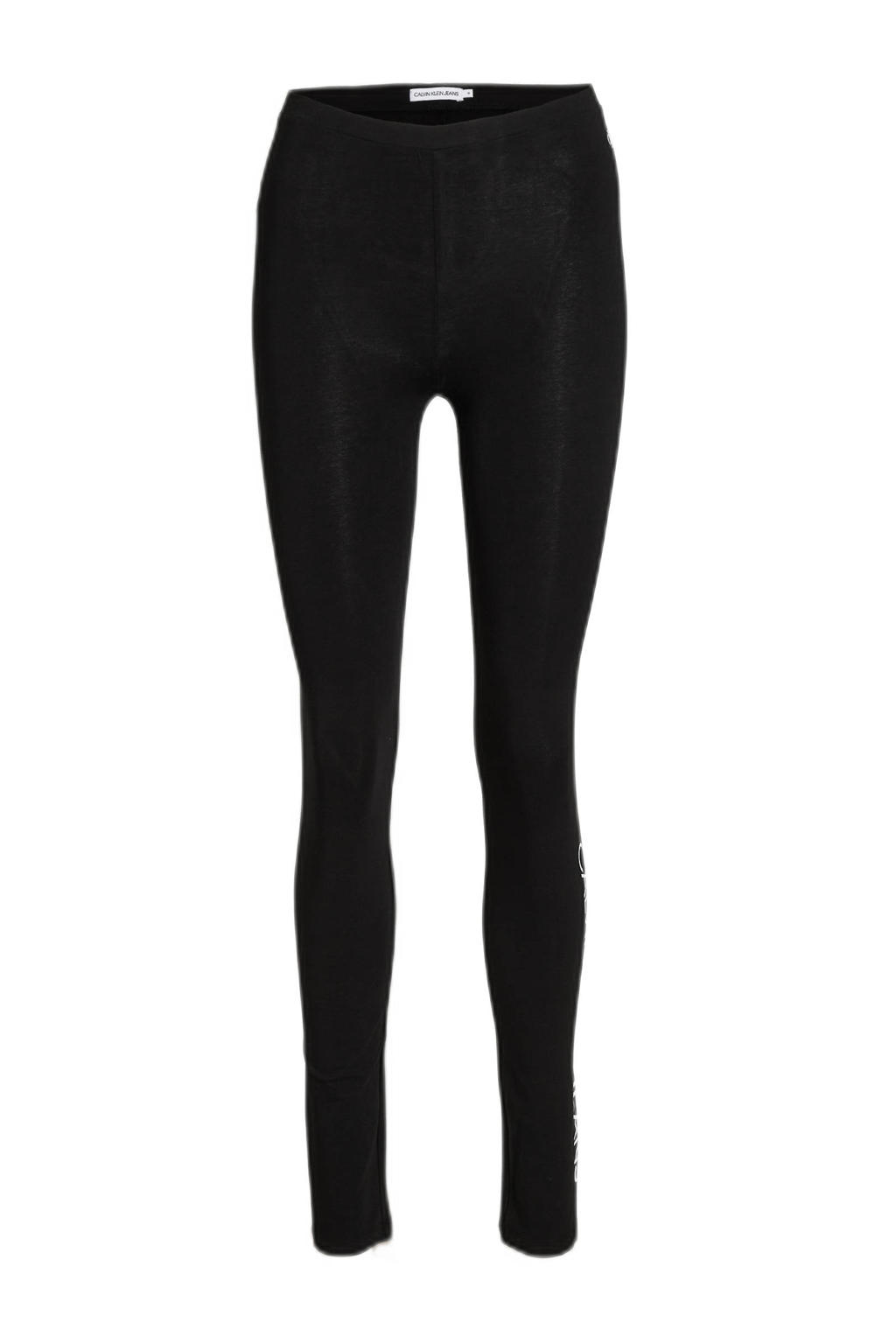 Zwart en witte meisjes CALVIN KLEIN JEANS legging van stretchkatoen met skinny fit, regular waist en logo dessin
