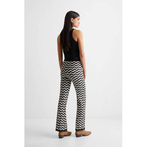 Mango Kids high waist flared broek met all over print zwart wit Meisjes Polyamide 152(XXS)