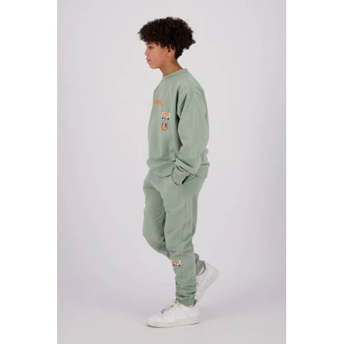 Raizzed tapered fit joggingbroek Tezu met logo zachtgroen Jongens Sweat 116