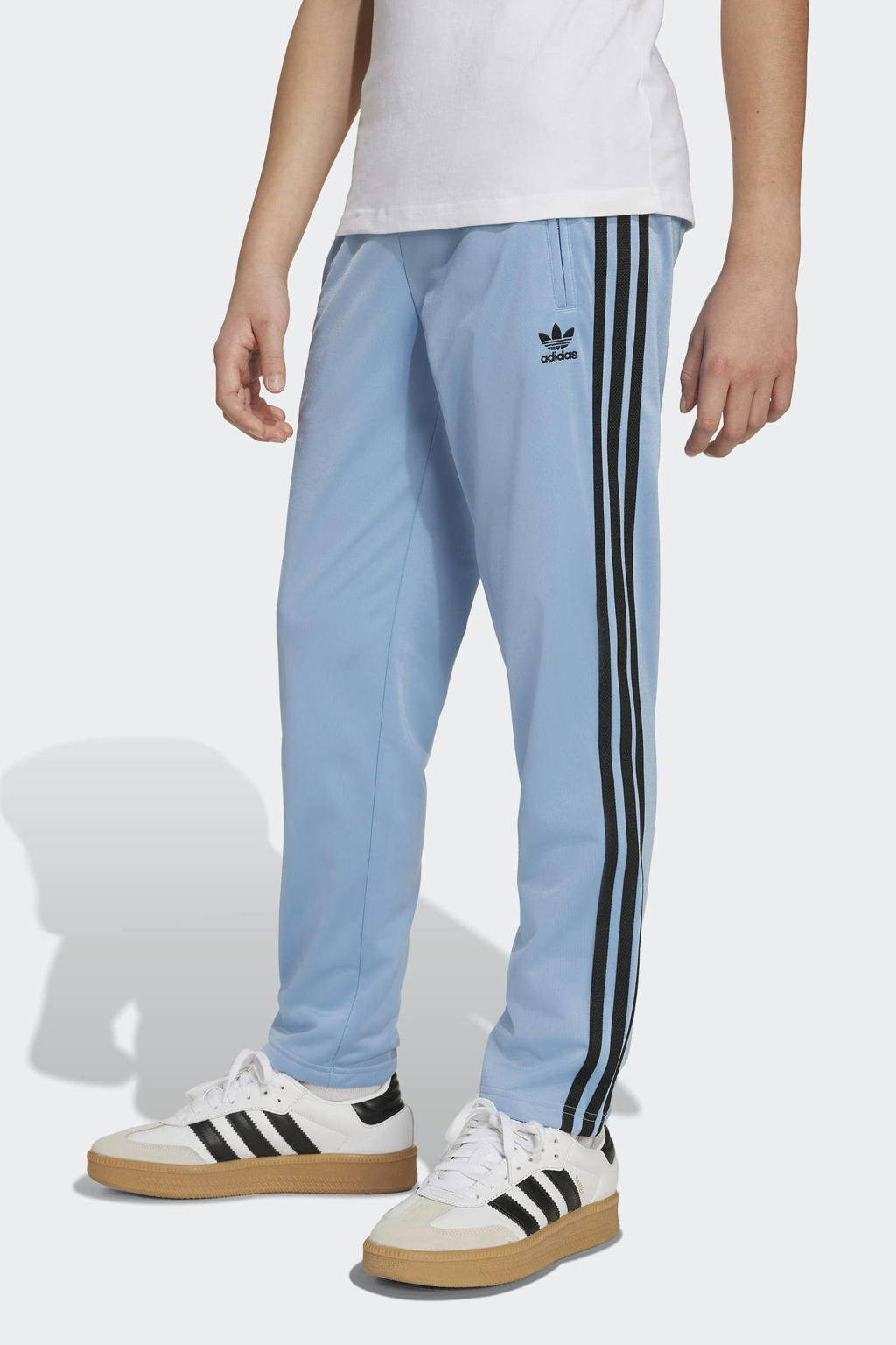 Lichtblauwe jongens en meisjes adidas Originals trainingsbroek Firebird van polyester met regular waist, ritssluiting en logo dessin
