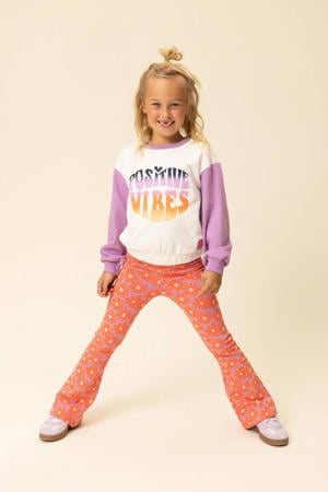 gebloemde flared broek koraalrood