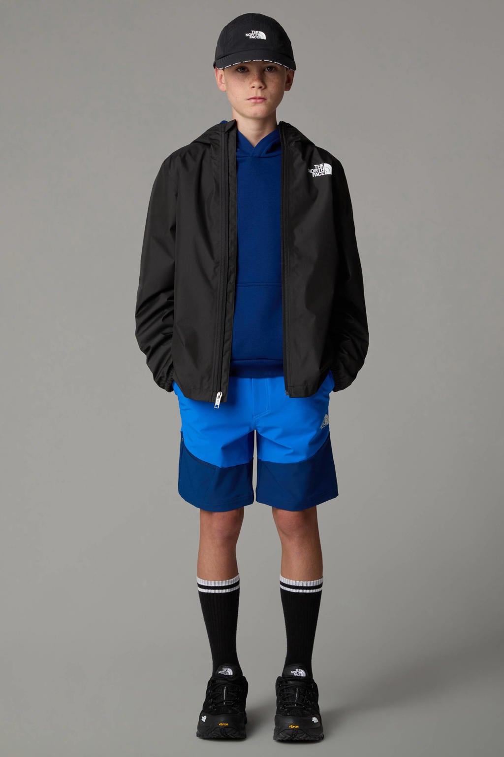Zwarte jongens en meisjes The North Face regenjas Zipline van polyester met effen, lange mouwen, capuchon en ritssluiting