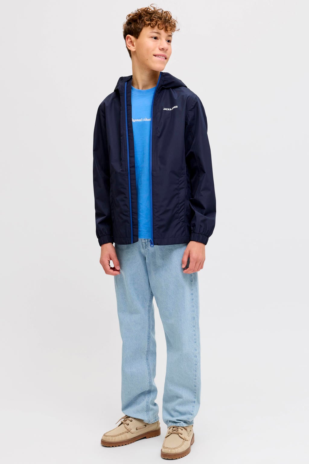 Donkerblauwe jongens JACK & JONES JUNIOR regenjas van polyester met effen, lange mouwen, capuchon en ritssluiting