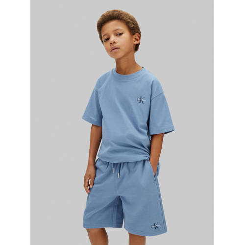 Calvin Klein T-shirt + sweatshort blauw Shirt + broek Jongens Katoen Ronde hals - maat 140 afbeelding