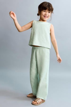mouwloze top mintgroen