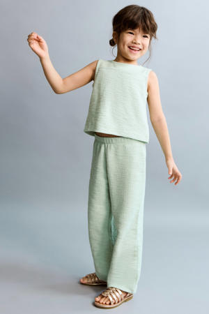 mouwloze top mintgroen